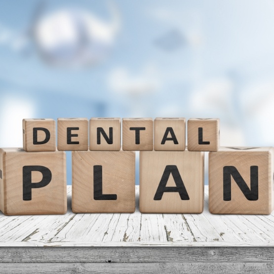 Wooden blocked spelling out Dental Plan