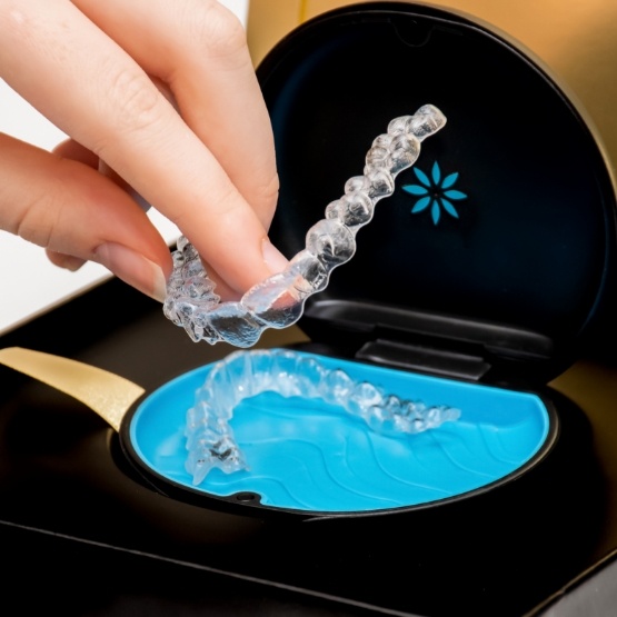 Taking Invisalign aligners out of case