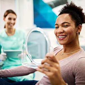 Patient looking at reflection in mirror