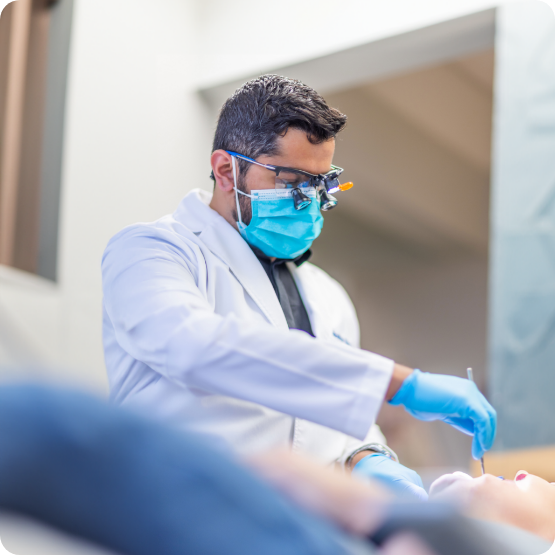 Woman receiving checkup from preventive dentist in Centennial