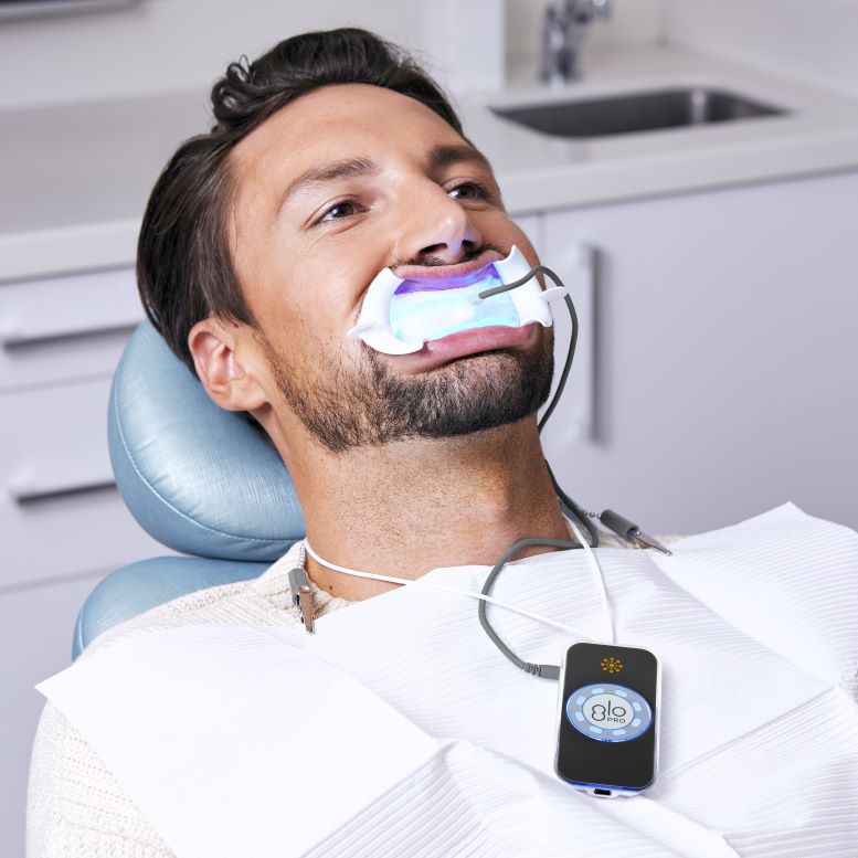 Man receiving GLO teeth whitening treatment